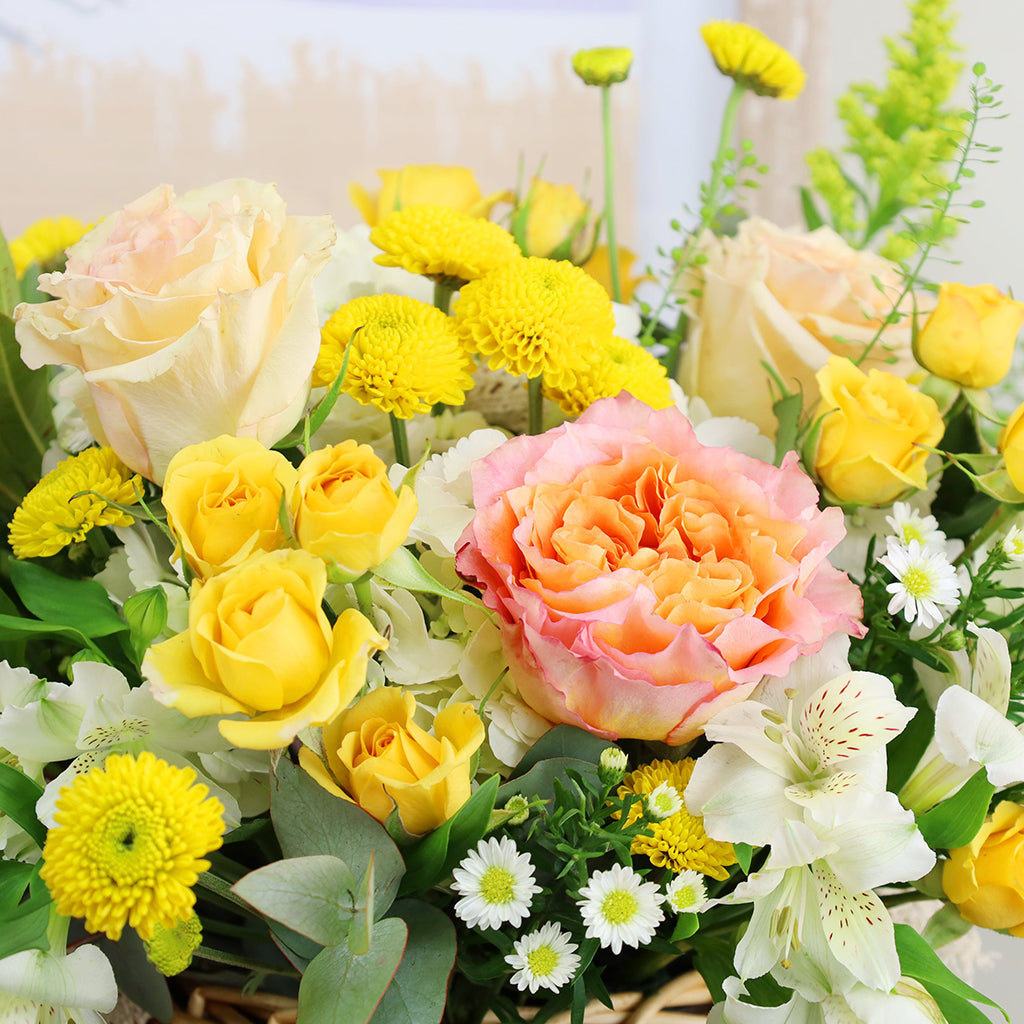 Batch of Free Spirit Roses, Pearl Finesse Roses, Yellow Spray Roses, Yellow Pompoms, Alstroemeria, and Tulips with Eucalyptus greeneries.